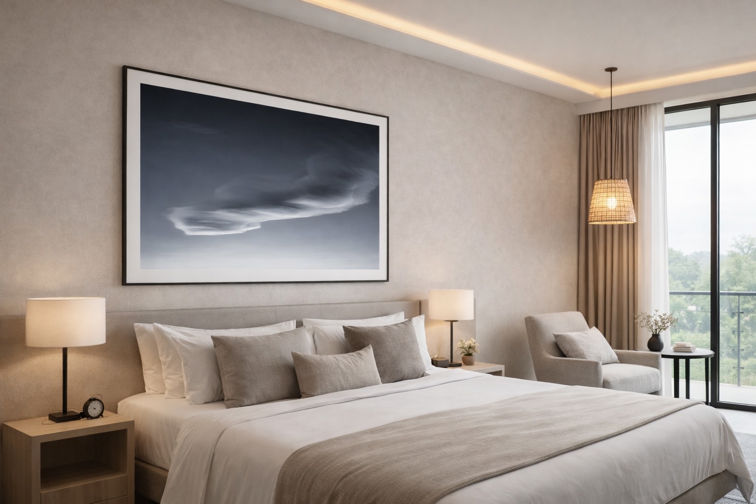 Large black and white fine art photograph above a sofa in a quiet contemporary living room with soft light and a bright central opening.