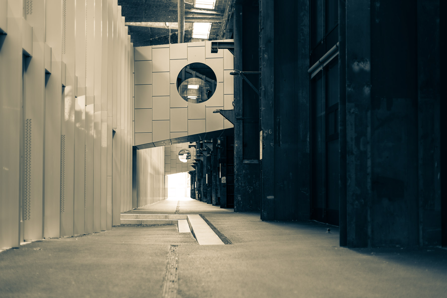 Historic urban facade with repeating geometric patterns suggesting memory and quiet order.