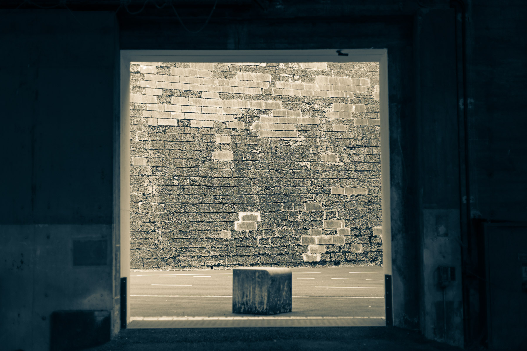 Historic urban facade with repeating geometric patterns suggesting memory and quiet order.